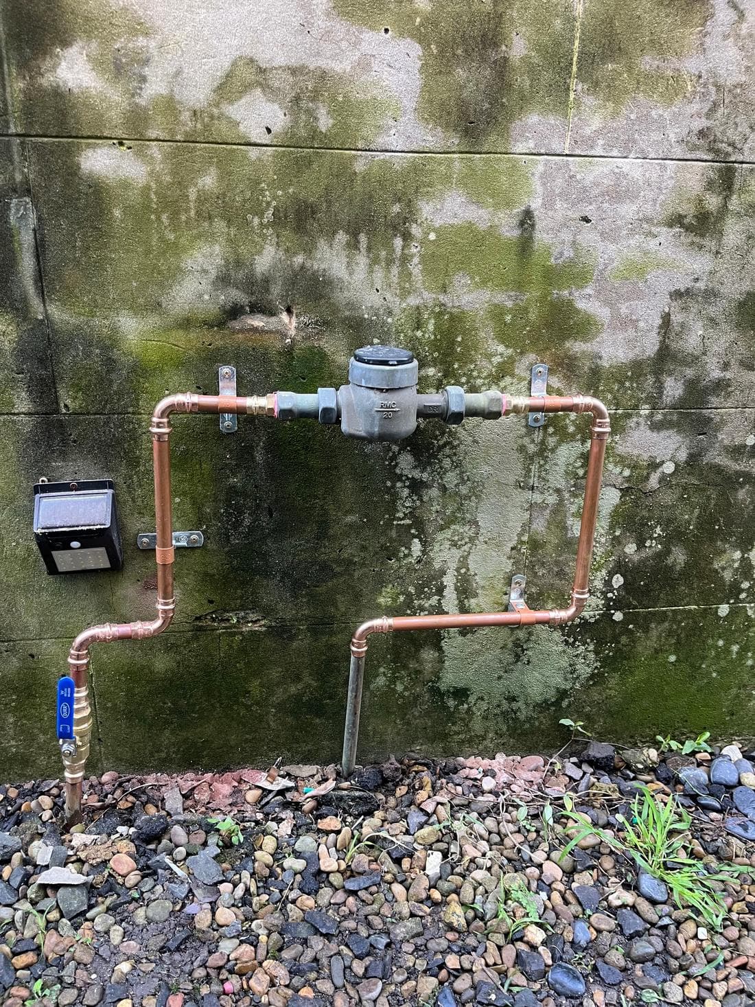Re-piped copper around a water meter